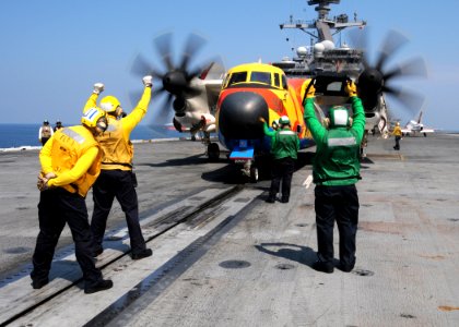 US Navy 100611-N-6509M-784 Air department Sailors prepare a C-2A Greyhound assigned to Fleet Logistics Support Squadron (VRC) 40 for launch aboard the aircraft carrier USS George H.W. Bush (CVN 77)