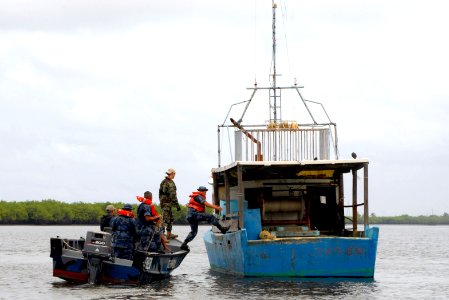 US Navy 100615-N-4971L-328 Sailors embarked aboard High Speed Vessel Swift (HSV 2) and members of the Nicaraguan navy board a fishing vessel during visit, board, search and seizure subject matter expert exchange operations