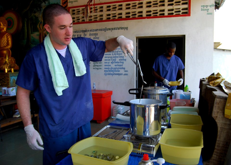 US Navy 100610-N-8539M-296 Sailors sterilize dental equipment during a Cooperation Afloat Readiness and Training (CARAT) Cambodia 2010 medical civic action project