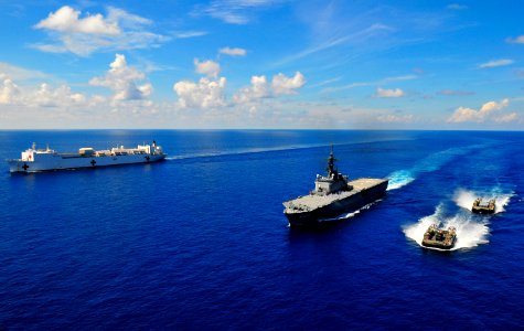 US Navy 100614-N-6597H-681 The Military Sealift Command hospital ship USNS Mercy (T-AH 19), left, the Japan Maritime Self-Defense Force Osumi-class amphibious assault ship JDS Kunisaki (LST 4003)