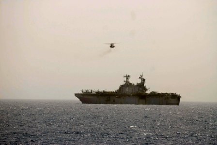 US Navy 100613-N-3358S-069 A CH-53E Super Stallion helicopter assigned to the Golden Eagles of Marine Medium Tiltrotor Squadron (VMM) 162 (Reinforced) returns to the amphibious assault ship USS Nassau (LHA 4)