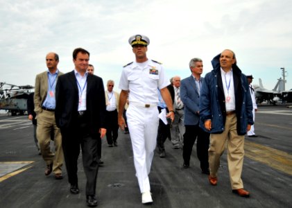 US Navy 100613-N-6003P-011 Cmdr. Patrick Ryan leads French dignitaries on a tour of the flight deck aboard the Nimitz-class aircraft carrier USS Harry S. Truman (CVN 75)