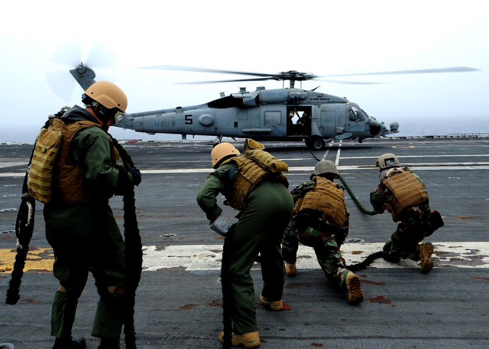 US Navy 100616-N-6720T-006 Sailors prepare to repel from an HH-60H Sea Hawk helicopter