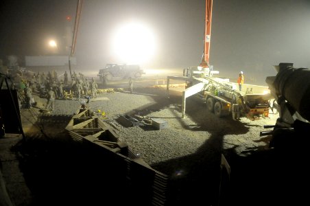 US Navy 100613-N-0475R-040 Seabees assigned to Naval Mobile Construction Battalion (NMCB) 5 place concrete at a project at Camp Leatherneck