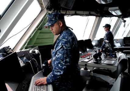 US Navy 100616-N-7058E-128 Chief Boatswain's Mate Franscisco Valdovinos and Lt. Charles Beauchene navigate USS Freedom (LCS 1)