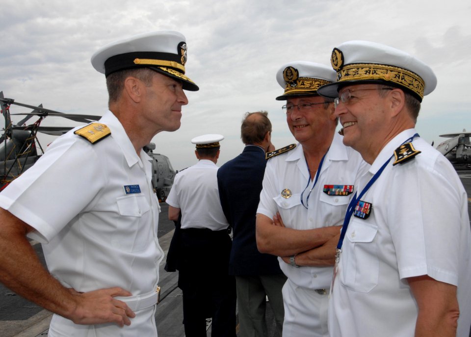US Navy 100613-N-3705H-023 Rear Adm. Patrick Driscoll, commander of Carrier Strike Group 10, speaks to admirals from the French navy visiting the Nimitz-class aircraft carrier USS Harry S. Truman (CVN 75)