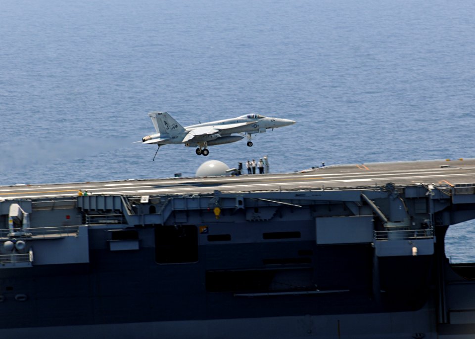 US Navy 100614-N-3885H-035 An F-A-18E Super Hornet lands aboard USS George H.W. Bush (CVN 77)
