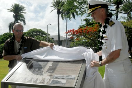 US Navy 100617-N-3666S-014 Base officials unveil a wayside exhibit during a ceremony at Hospital Point