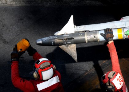 US Navy 100616-N-4236E-148 Aviation Ordnancemen prepare ordnance before flight operations aboard the aircraft carrier USS Dwight D. Eisenhower (CVN 69)