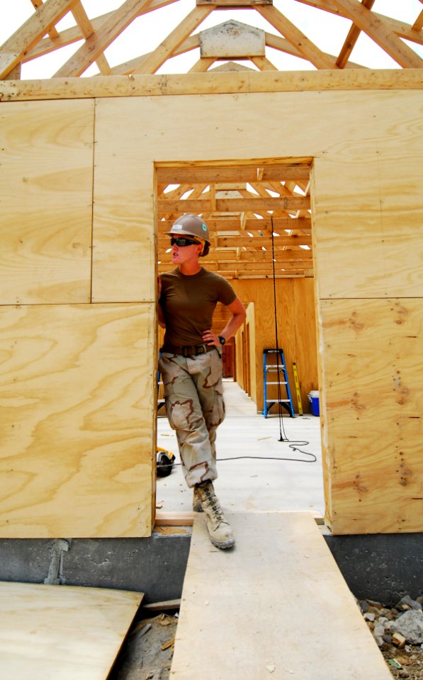 US Navy 100616-N-6538W-009 Builder 3rd Class Amber Mann, from Gautier, Miss., assigned to Naval Mobile Construction Battalion (NMCB) 4, surveys the construction site at a forward outpost in Kunduz, Afghanistan