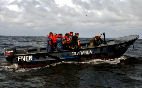 US Navy 100615-N-4971L-126 Sailors deployed aboard High Speed Vessel Swift (HSV 2) and members of the Nicaraguan navy conduct visit, board, search and seizure subject matter expert exchange operations photo