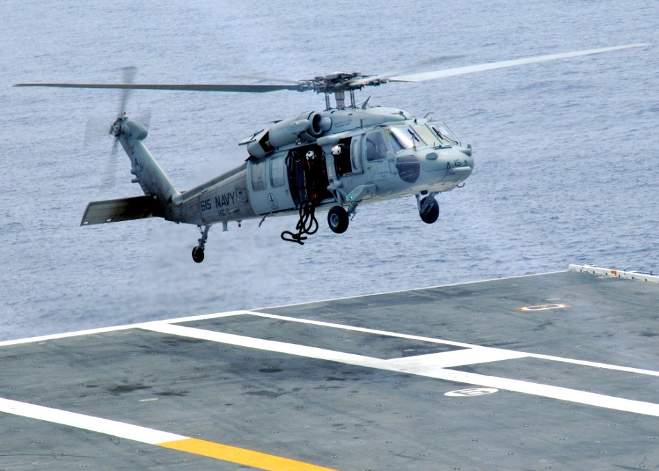 US Navy 100615-N-7908T-891 Sailors practice repelling drills on the flight deck of USS George H.W. Bush (CVN 77)