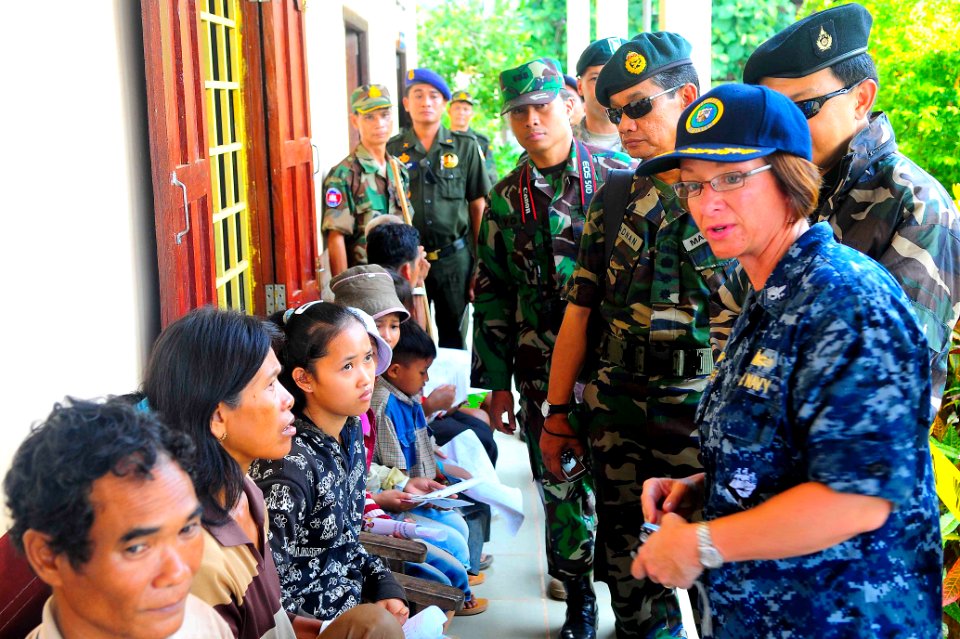 US Navy 100618-N-6410J-090 Capt. Lisa M. Franchetti, right, commander of Pacific Partnership 2010, speaks with Cambodian citizens at a Pacific Partnership 2010 medical civic action event in Rattanakiri, Cambodia