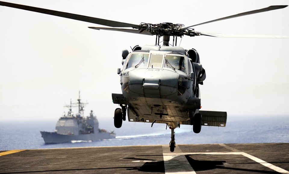 US Navy 100616-N-7317W-009 An MH-60S Sea Hawk helicopter assigned to the Dragon Whales of Helicopter Sea Combat Squadron (HSC) 26 lifts off the flight deck of the aircraft carrier USS Harry S. Truman (CVN 75)