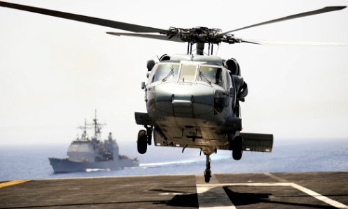 US Navy 100616-N-7317W-009 An MH-60S Sea Hawk helicopter assigned to the Dragon Whales of Helicopter Sea Combat Squadron (HSC) 26 lifts off the flight deck of the aircraft carrier USS Harry S. Truman (CVN 75)