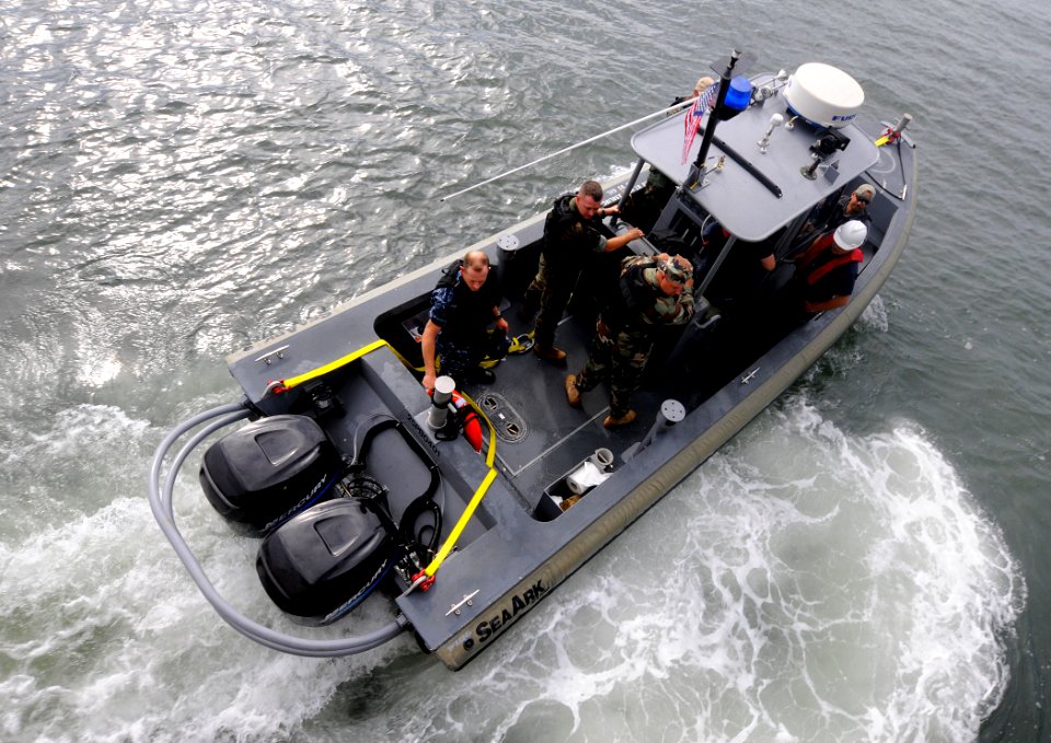 US Navy 100616-N-9643W-243 Sailors and Marines aboard High Speed Vessel Swift (HSV 2) launch a small boat during a Southern Partnership Station 2010 training exercise