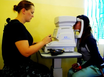 US Navy 100616-N-5207L-039 Hospital Corpsman 2nd Class Stephanie Stout pre-screens a patient for an eye exam during a Pacific Partnership 2010 medical civic action program at the Sihanouk Provincial Hospital photo