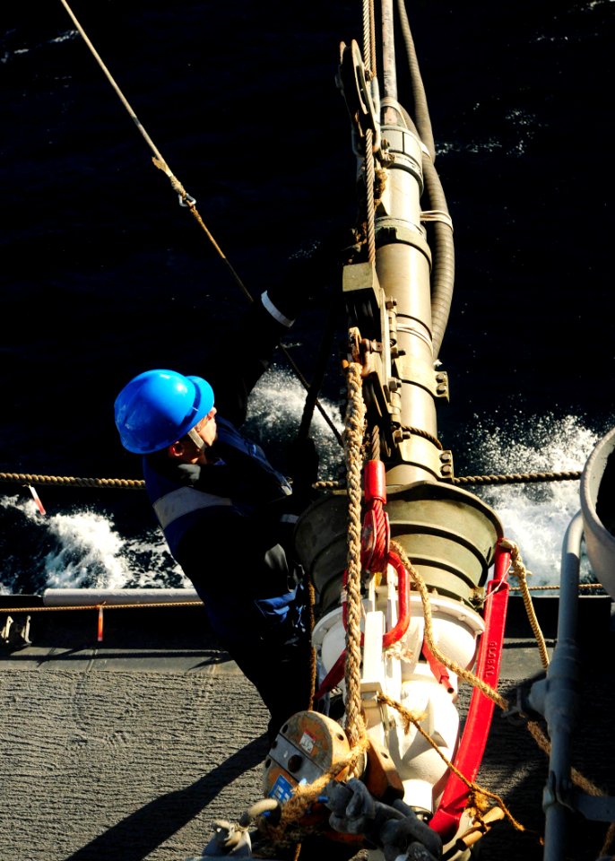 US Navy 100616-N-9301W-153 The fuel nozzle is secured aboard the guided-missile frigate USS Klakring (FFG 42) during an underway replenishment with the Chilean replenishment ship CNS Araucano (AO 53)