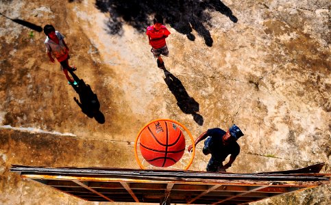 US Navy 100620-N-6597H-186 Yeoman 2nd Class Ceroromo Bragg plays basketball during a Pacific Partnership 2010 community service event at the Enfants du Cambodge orphanage in Sihanoukville, Cambodia