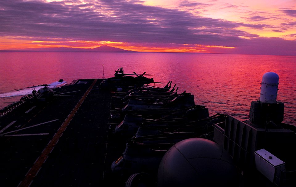 US Navy 100620-N-7948R-752 The amphibious assault ship USS Peleliu (LHA 5) is underway off the coast of Timore-Leste at dusk