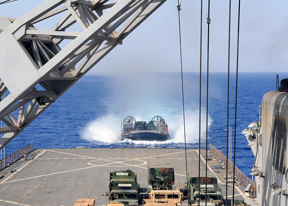 US Navy 100621-N-1082Z-008 Landing Craft Air Cushion (LCAC) 67, assigned to Assault Craft Unit (ACU) 4, transports personnel and equipment