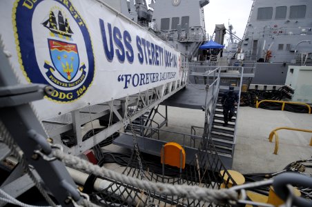 US Navy 100621-N-0775Y-001 A Sailor exits the brow of USS Sterett (DDG 104)
