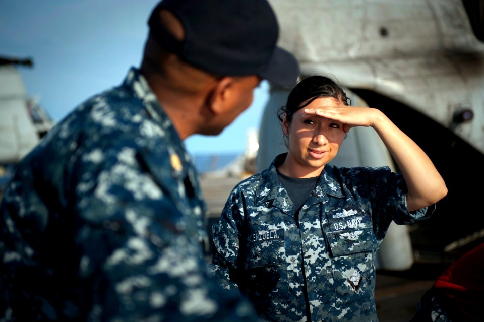 US Navy 100623-N-5319A-004 Ship's Serviceman 1st Class Garnet Valenzuela speaks with Chief Master-at-Arms Gerard Icar aboard the amphibious transport dock ship USS New Orleans (LPD 18)