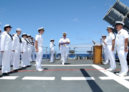US Navy 100623-N-3327M-055 Sailors participate in a burial at sea aboard USS Chosin (CG 65) photo