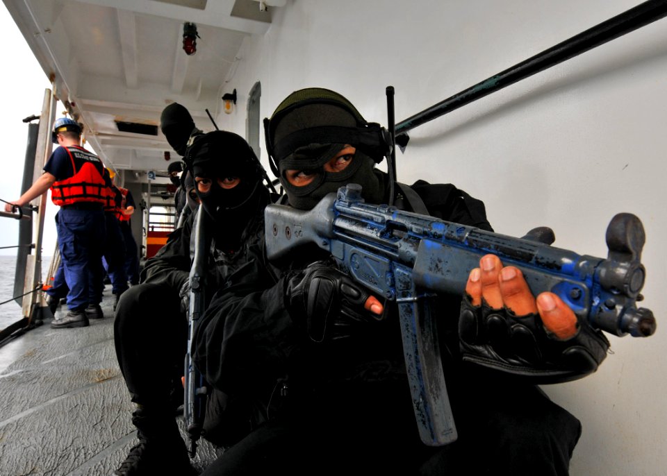 US Navy 100623-N-7643B-072 Royal Malaysian Navy sailors stand security watch during a boarding exercise aboard the U.S. Coast Guard cutter (USCGC) Mellon (WHEC 717) as part of Southeast Asia Cooperation Against Terrorism (SEACA