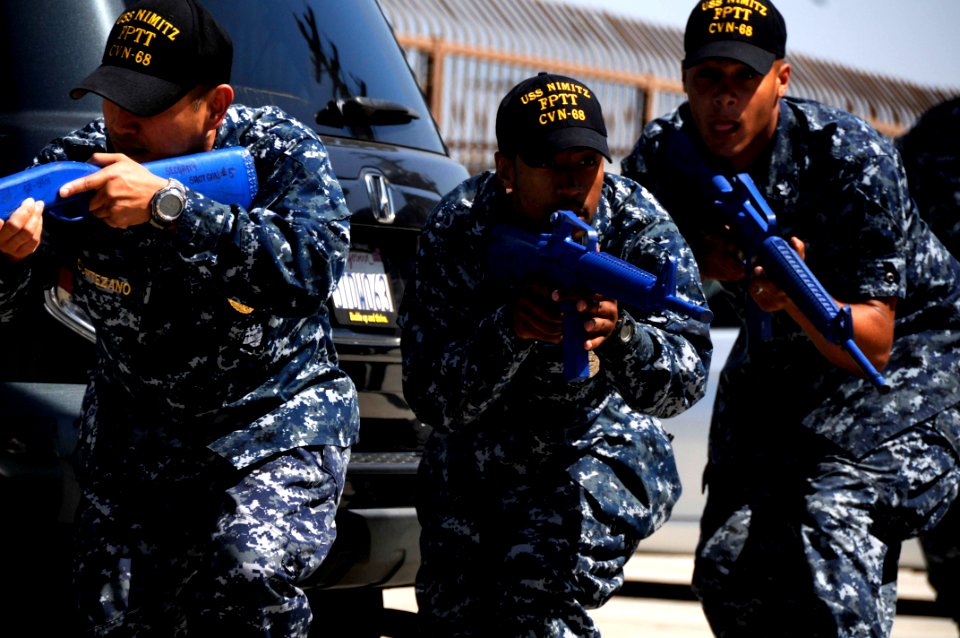 US Navy 100624-N-2918M-046 Sailors assigned to the force protection training team of the aircraft carrier USS Nimitz (CVN 68) demonstrate how to properly advance in dangerous situations