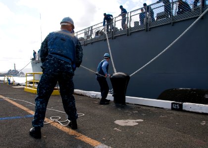 US Navy 100622-N-6674H-005 Sailors moor the Japan Maritime Self-Defense Force guided-missile destroyer JS Atago (DDG 177) as the ship arrives at Joint Base Pearl Harbor-Hickam for Rim of the Pacific (RIMPAC) 2010
