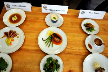 US Navy 100624-N-9818V-116 Sailors present their meals to be judged at the Commander Navy Installations Command's 2nd annual Culinary Competition at CulinAerie photo