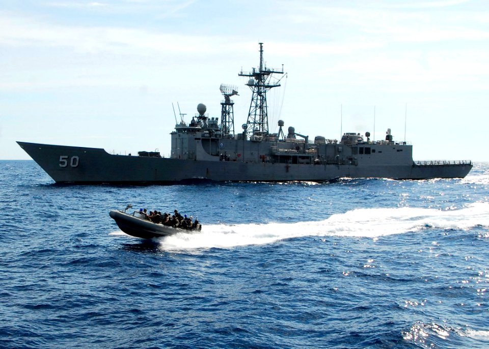 US Navy 100623-N-7638K-316 A visit, board, search and seizure team approaches the Oliver Hazard Perry-class frigate USS Taylor (FFG 50) during a joint training exercise with the Croatian coast guard