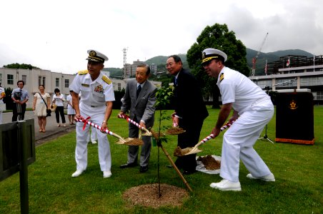 US Navy 100623-N-8335D-024 Guests plant a cherry blossom tree to commemorate the 50th anniversary of the Japan-U.S. Treaty of Mutual Cooperation and Security