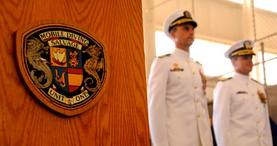 US Navy 100624-N-7498L-250 Cmdr. Thomas Murphy, right, relieves Cmdr. John Moulton, left, as the new commanding officer of Mobile Diving Salvage Unit (MDSU) 1 during a command ceremony at Joint Base Pearl Harbor-Hickam