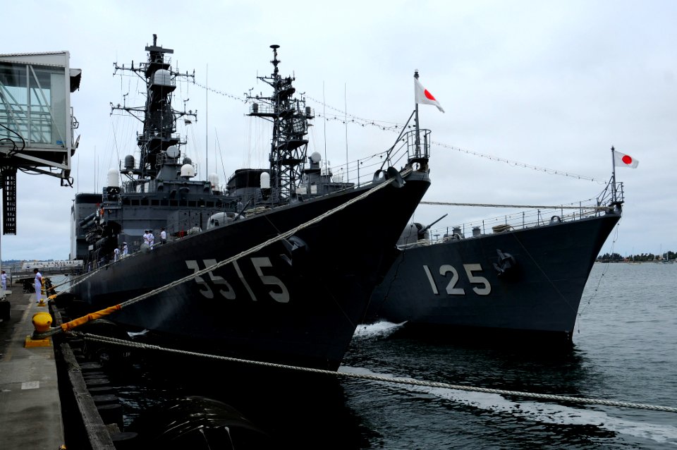 US Navy 100626-N-5749W-410 Japan Maritime Self-Defense Force (JMSDF) sailors assigned to training squadron JS Yamagiri (TV-3515) and the destroyer JS Sawayuki (DD-125) give tours of their vessels during a cultural exchange fest