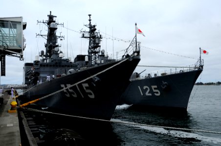 US Navy 100626-N-5749W-410 Japan Maritime Self-Defense Force (JMSDF) sailors assigned to training squadron JS Yamagiri (TV-3515) and the destroyer JS Sawayuki (DD-125) give tours of their vessels during a cultural exchange fest