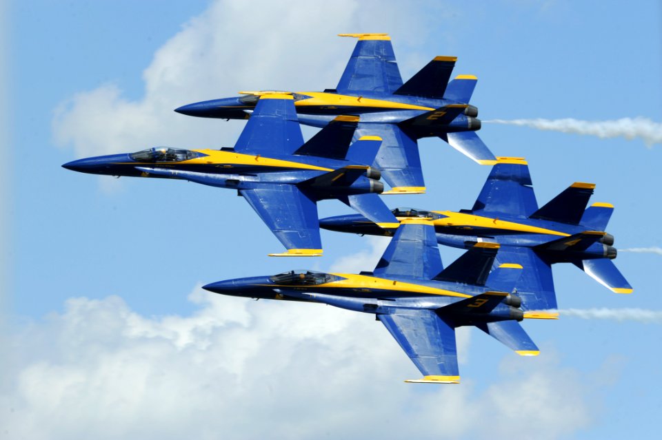 US Navy 100627-N-0092J-055 Pilots assigned to the U.S. Navy flight demonstration squadron, the Blue Angels, perform the diamond 360 maneuver at the Great Minnesota Air Show