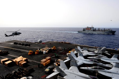 US Navy 100627-N-6604E-437 The Military Sealift Command dry cargo and ammunition ship USNS Robert E. Peary (T-AKE 5) is underway alongside the aircraft carrier USS Dwight D. Eisenhower (CVN 69)