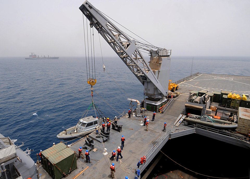 US Navy 100626-N-1082Z-039 Sailors aboard the amphibious dock landing ship USS Ashland (LSD 48) prepare a rigid hull inflatable boat for the transfer
