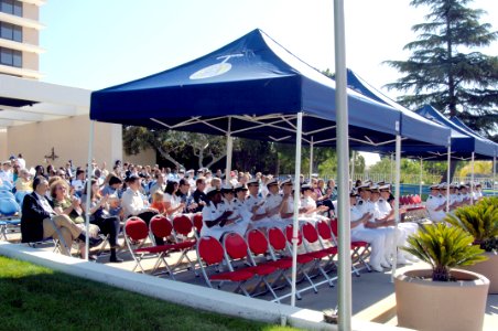 US Navy 100625-N-3931M-041 Graduates and guests respond to a speech during the annual graduation ceremony of the Naval Hospital Camp Pendleton Residency graduation ceremony