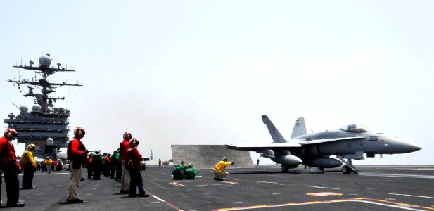 US Navy 100629-N-6003P-091 An F-A-18C Hornet assigned to the Ragin' Bulls of Strike Fighter Squadron (VFA ) 37 launches from the aircraft carrier USS Harry S. Truman (CVN 75)