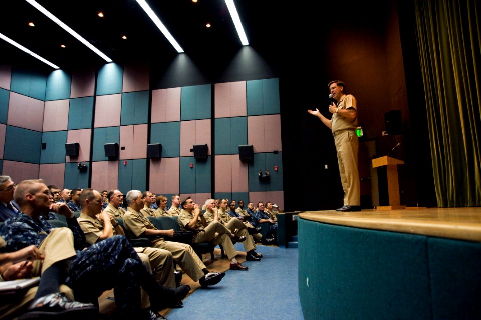 US Navy 100629-N-7526R-067 ice Adm. Mark Ferguson, Chief of Naval Personnel, addresses military members and civilians from various Naples-area commands during an all-hands call at Naval Support Activity Naples