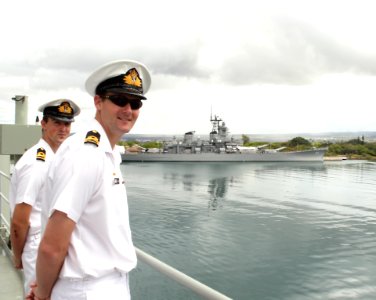 US Navy 100626-O-8247T-085 Lt. Daniel Hodgkinson, right, and Lt. Simon Driessen assigned of the Royal Australian Navy amphibious landing platform HMAS Kanimbla (L 51) arrive in Pearl Harbor, Hawaii with the USS Missouri memoria photo