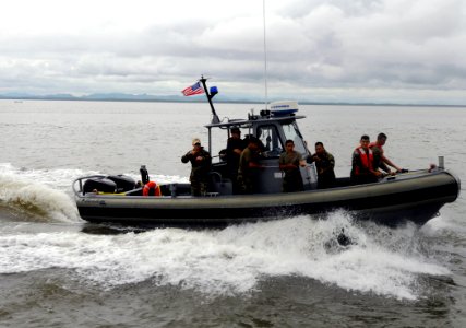 US Navy 100629-N-9643W-577 U.S. and El Salvadorian sailors ride in a U.S. Navy rigid-hull inflatable boat