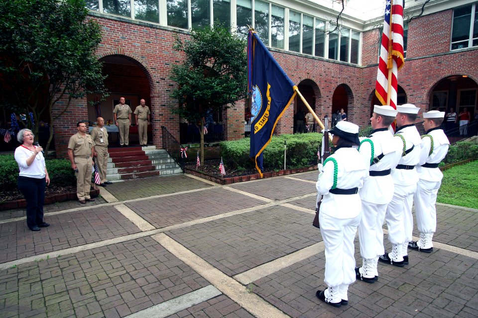 US Navy 100701-N-4482V-002 Dr. Jill Stien, from the Naval Education and Training Command, sings the national anthem