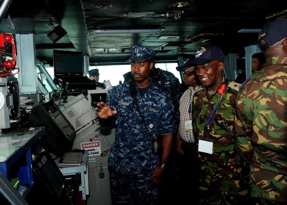 US Navy 100629-N-4236E-592 Distinguished visitors from U.S. Africa Command and Combined Joint Task Force, Horn of Africa learn about bridge operations during a tour of the Nimitz-class aircraft carrier USS Dwight D. Eisenhower