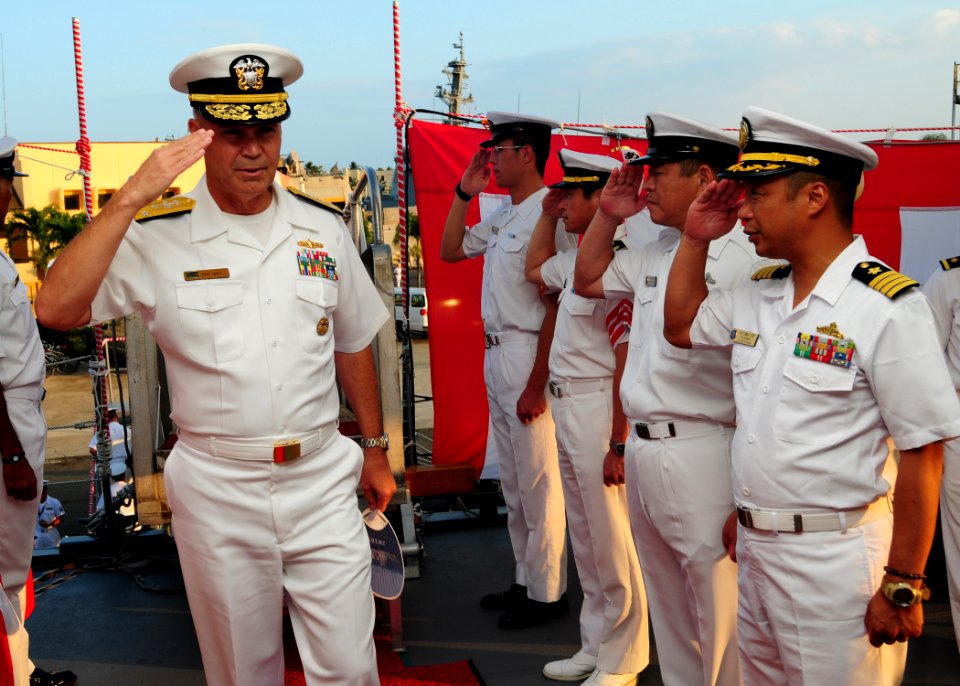 US Navy 100628-N-3570S-022 Vice Adm. Richard W. Hunt is greeted as he arrives aboard the Japan Maritime Self-Defense Force guided-missile destroyer JS Atago (DDG 177)
