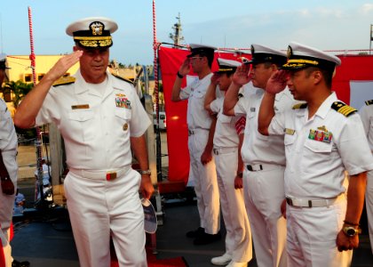 US Navy 100628-N-3570S-022 Vice Adm. Richard W. Hunt is greeted as he arrives aboard the Japan Maritime Self-Defense Force guided-missile destroyer JS Atago (DDG 177)