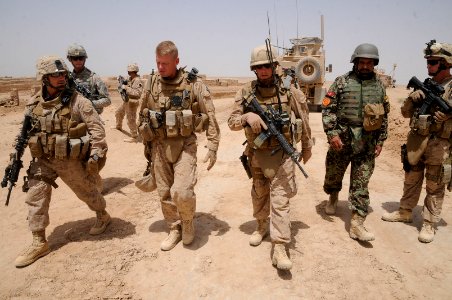 US Navy 100628-N-0475R-287 Seabees, Marines, Soldiers and members of the Afghan National Army take a tour of an area surrounding a newly completed Mabey-Johnson Bridge project